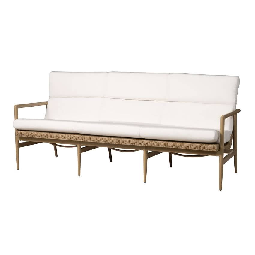 Wicker outdoor sofa with white cushions on a white background