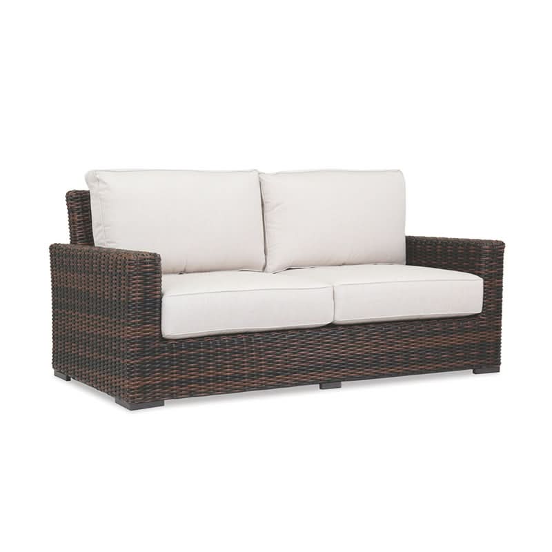 Sunset West Montecito Wicker Outdoor Loveseat in Canvas Flax w/ Self Welt