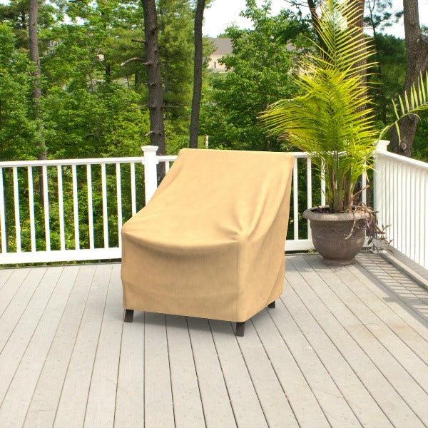 Budge Industries All Seasons Patio Chair Cover covering a chair on the patio