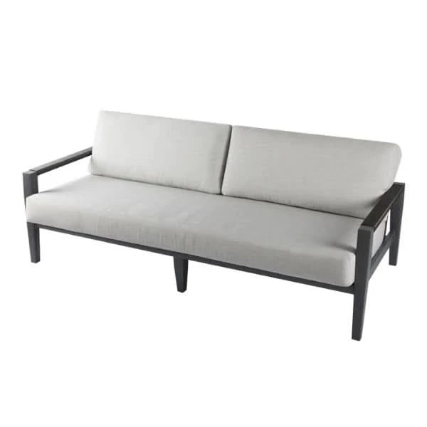 A modern outdoor sofa with light gray fabric cushions and a dark gray frame, shown from a three-quarter angle on a white background.