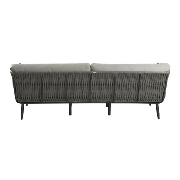 Back view of a sofa with a white background