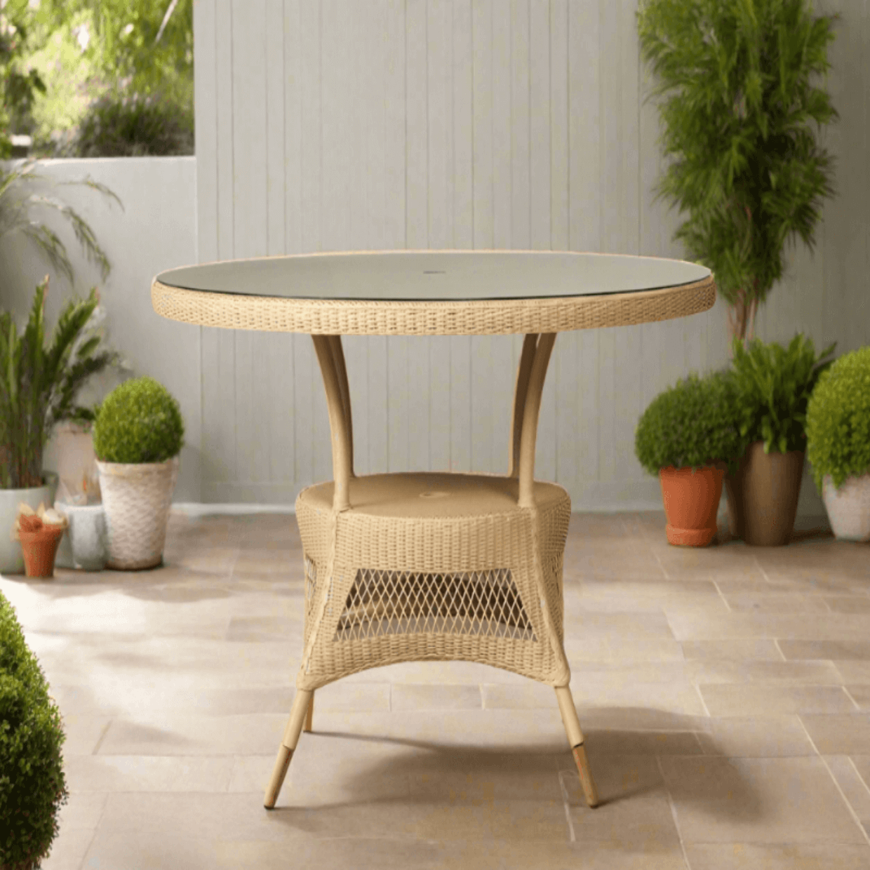 Lloyd Flanders Loom 49" Round Umbrella Dining Table