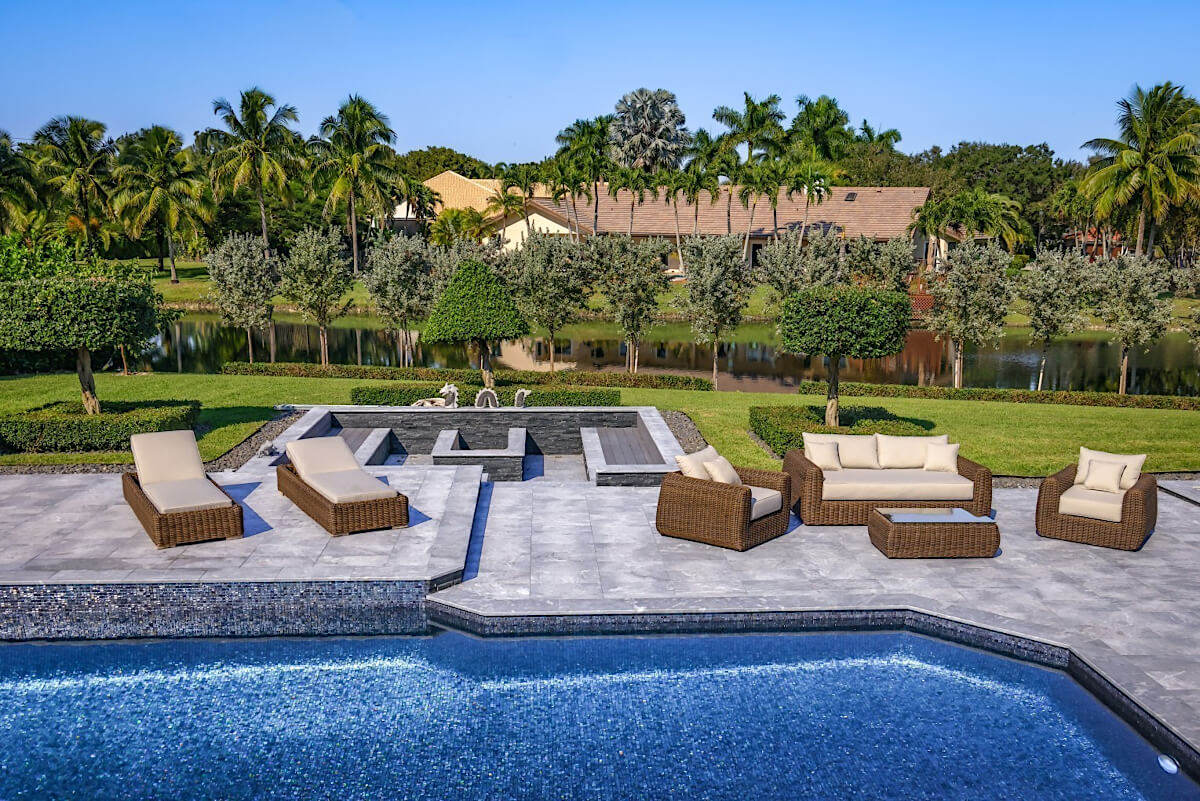 OUTSY Milo LUX 4-Piece Outdoor and Backyard Extra Deep Seating Wicker Aluminum Frame Furniture Set with Wicker Coffee Table in Brown - with sun loungers