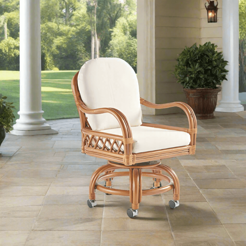 South Sea Rattan Antigua Rattan Indoor Swivel Caster Dining Armchair