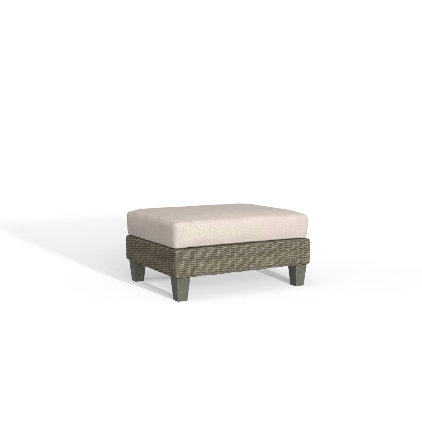 A rectangular outdoor ottoman with a light beige cushioned top and a textured gray-green woven base on short legs, shown on a plain white background.