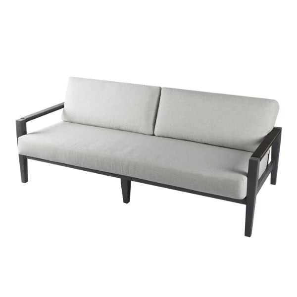 A modern outdoor sofa with light gray fabric cushions and a dark gray frame, shown from a three-quarter angle on a white background.