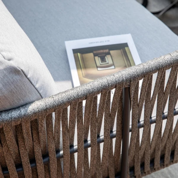 A close-up image of the armrest of a sofa