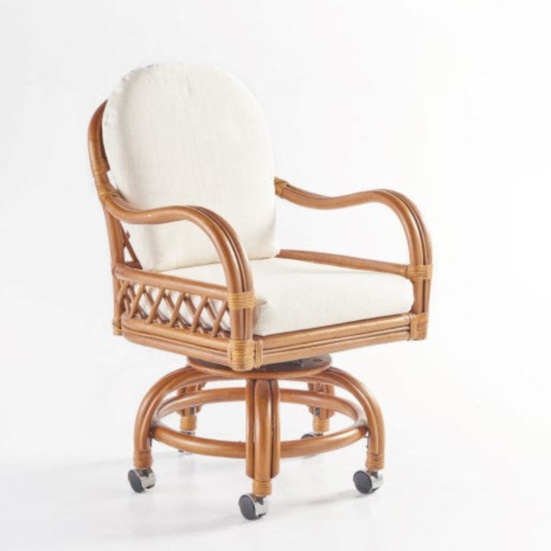 South Sea Rattan Antigua Rattan Indoor Swivel Caster Dining Armchair